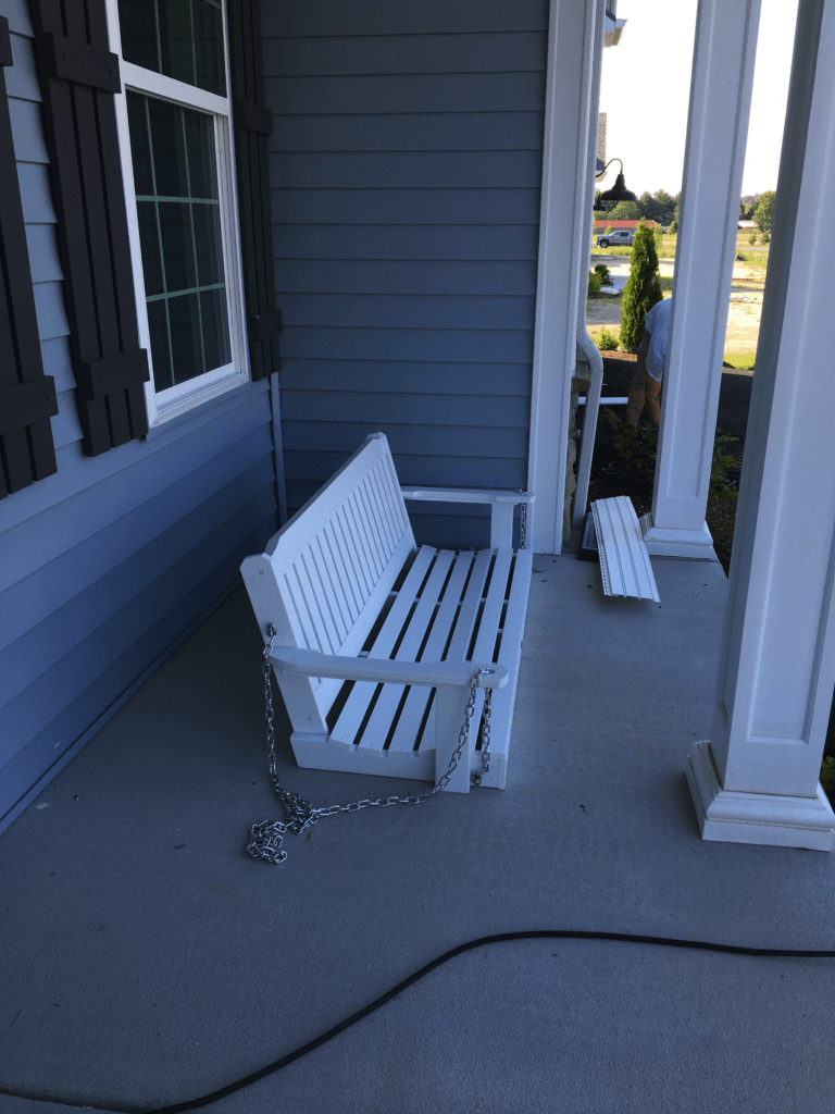 Porch bottom with unattached swing