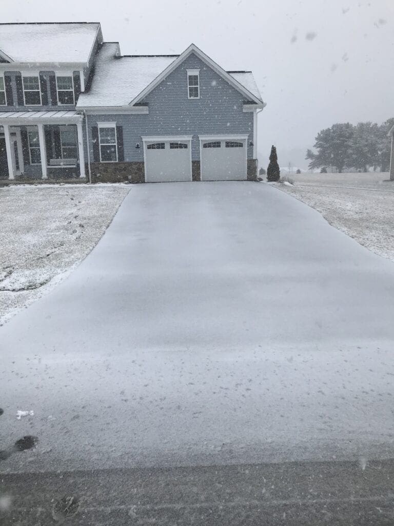 Should I Salt My Driveway Before It Snows? - Snow on our driveway