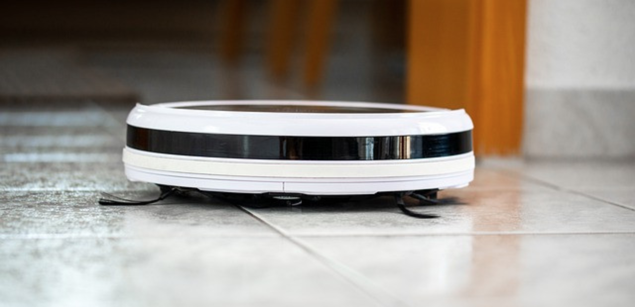 Do Robot Vacuum Cleaners Really Work? - Robot vacuum cleaner cleaning the floor