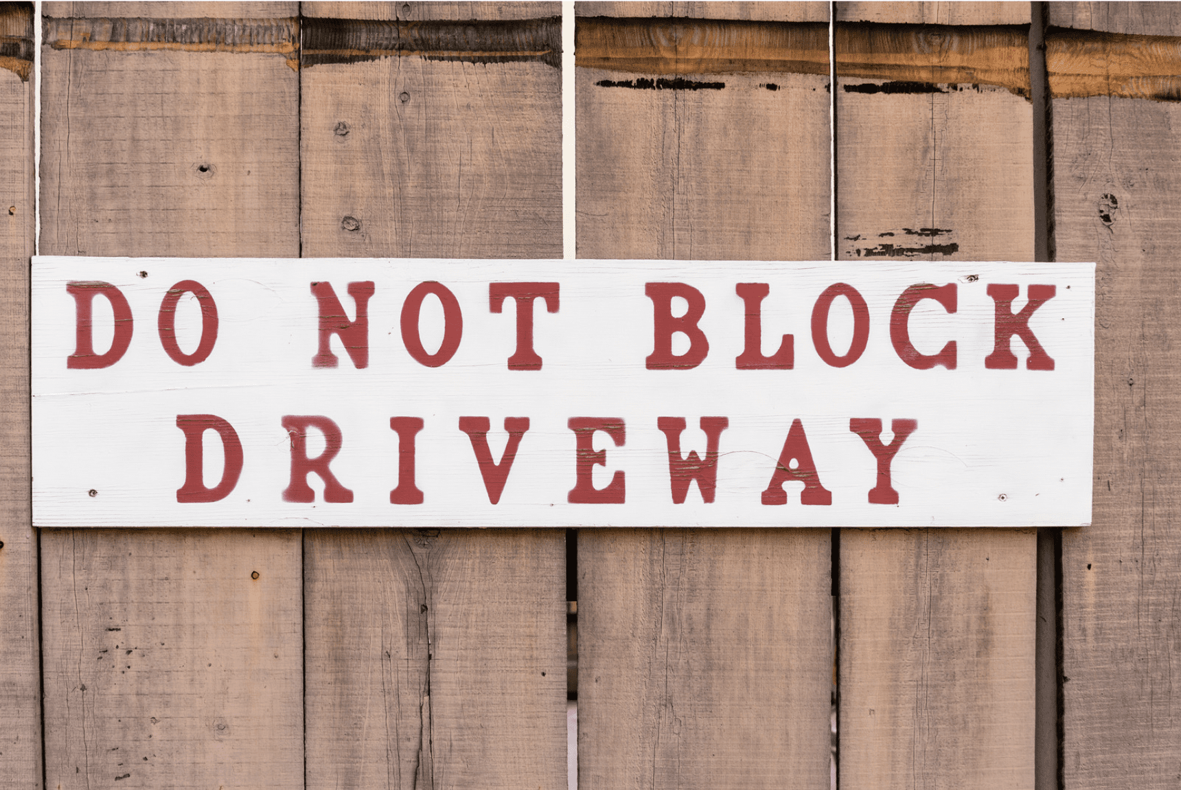 Is It Illegal to Block Your Own Driveway? Sign